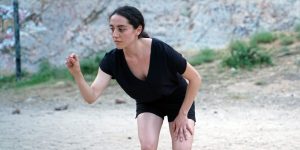 Dancer in nature with hand pointing out